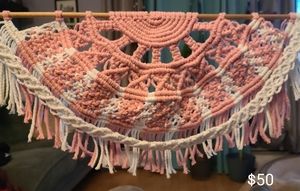 Pink and white macrame wall hanging